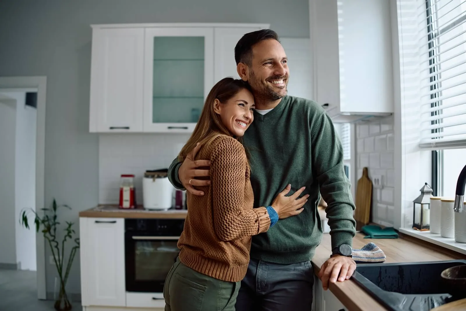 Happy couple at home